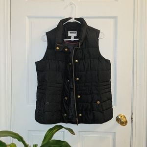 Black and gold vest